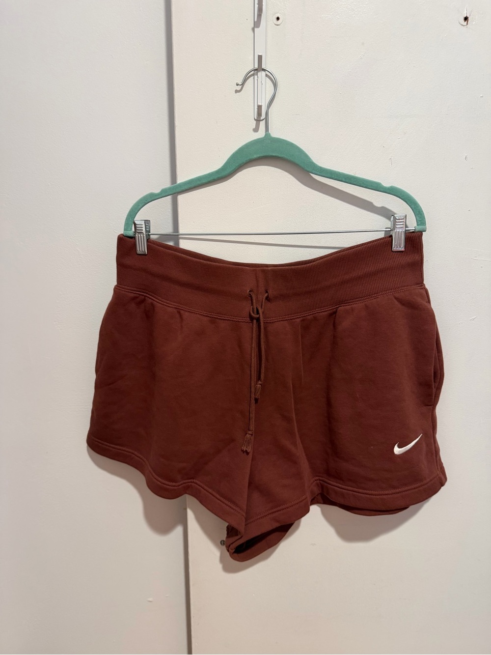 Nike Women's Rust Brown Drawstring Athletic Shorts with White Swoosh